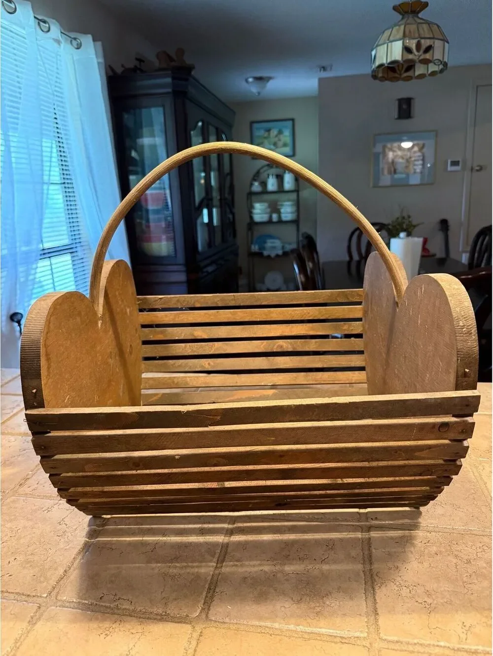 Very large wooden heart basket.see pictures and live. Handle looks crooked.